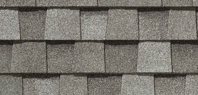 A piece of grey color roofing shingle